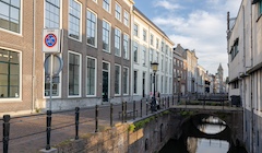 A canal way between buildings in Utrecht, the Netherlands.